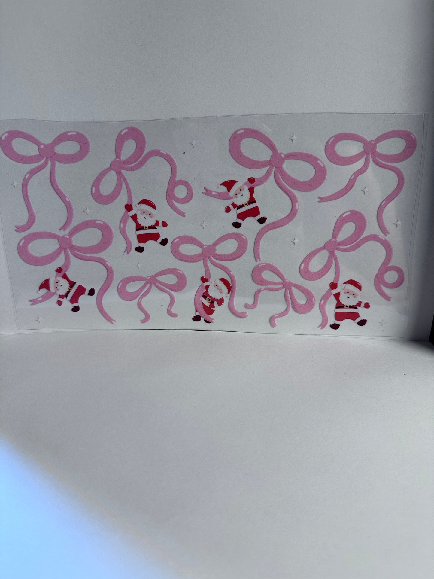 Pink Bows & Hanging Santas